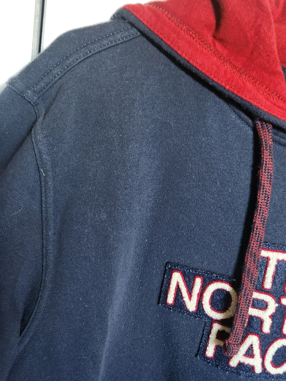 The North Face Navy Pullover Hoodie with Red Lined Hood